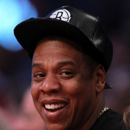 HOUSTON, TX - FEBRUARY 17:  Jay-Z smiles during the 2013 NBA All-Star game at the Toyota Center on February 17, 2013 in Houston, Texas. (Photo by Ronald Martinez/Getty Images)